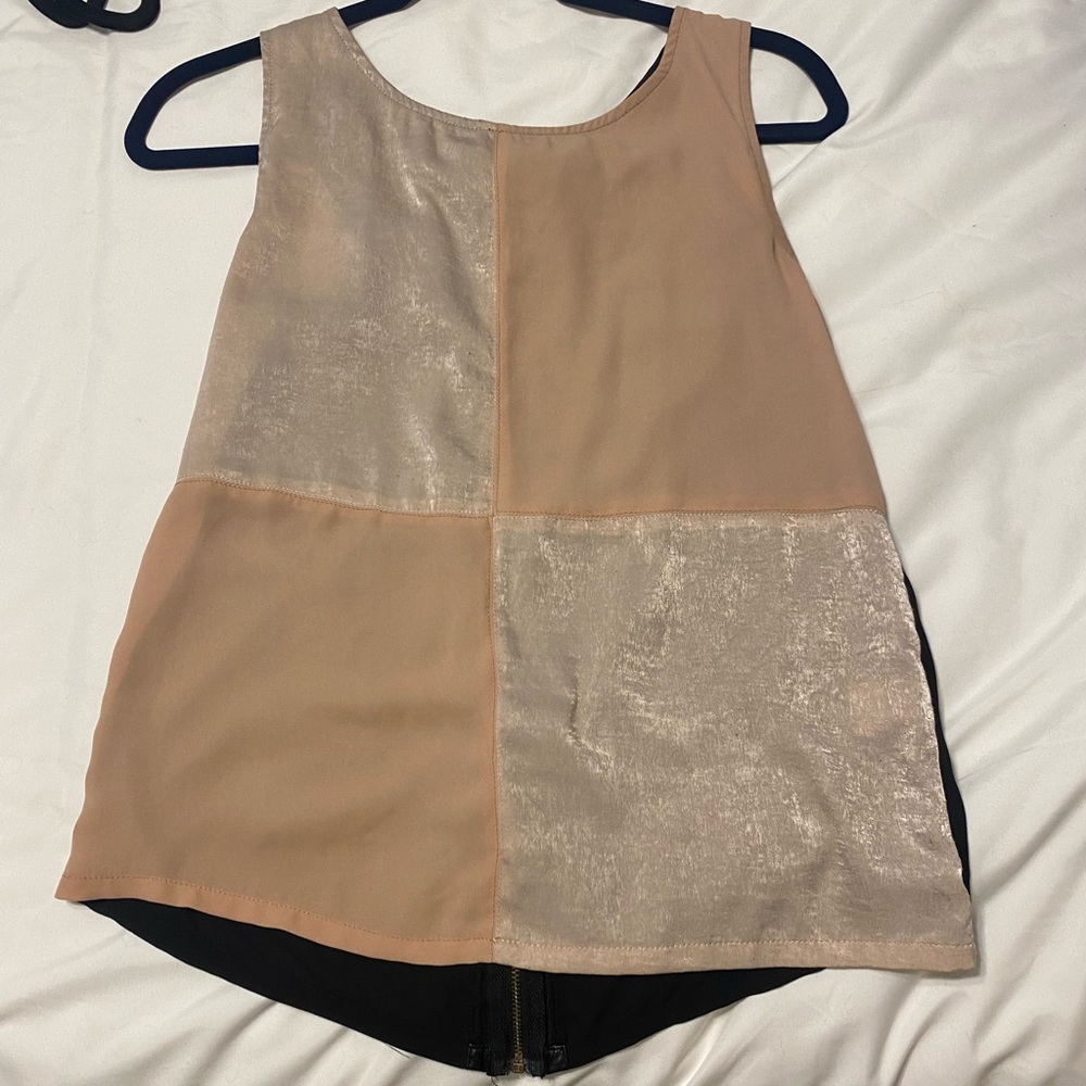 Cream, black, and brown top